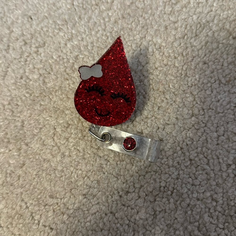 Blood drop badge reel